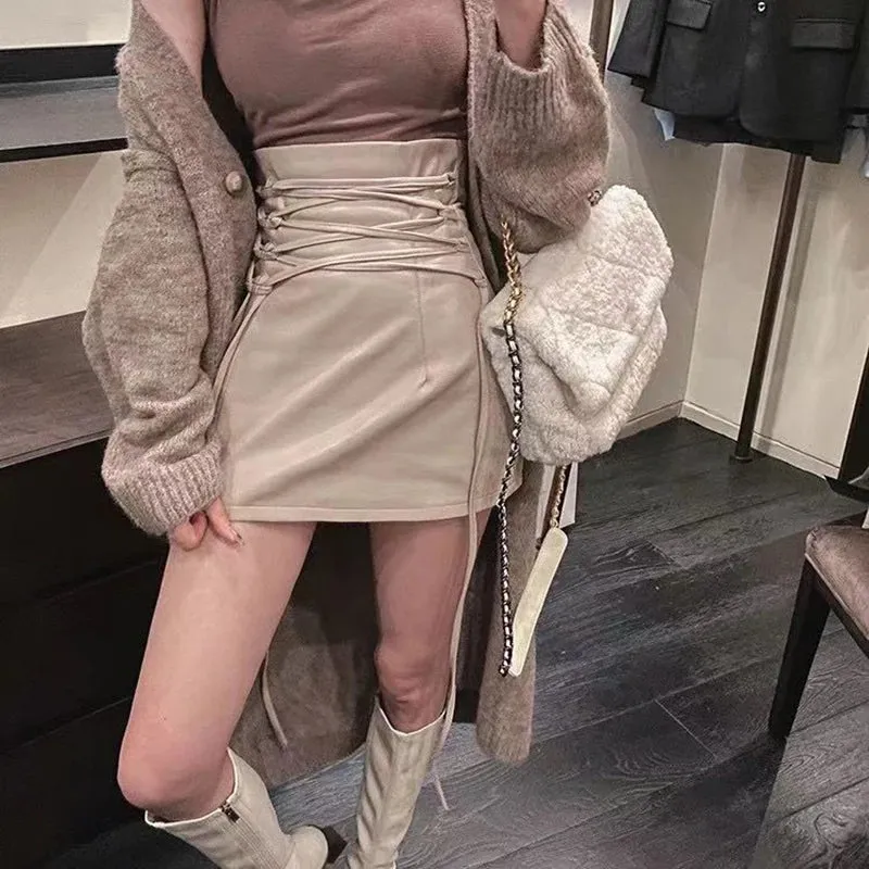 Gothic-Inspired Black Leather Mini Skirt High-Waisted, Slim Fit, Lace-Up Pencil Style with Sexy Club Appeal, Back Zipper, and Split Bag Hip Detail for Women