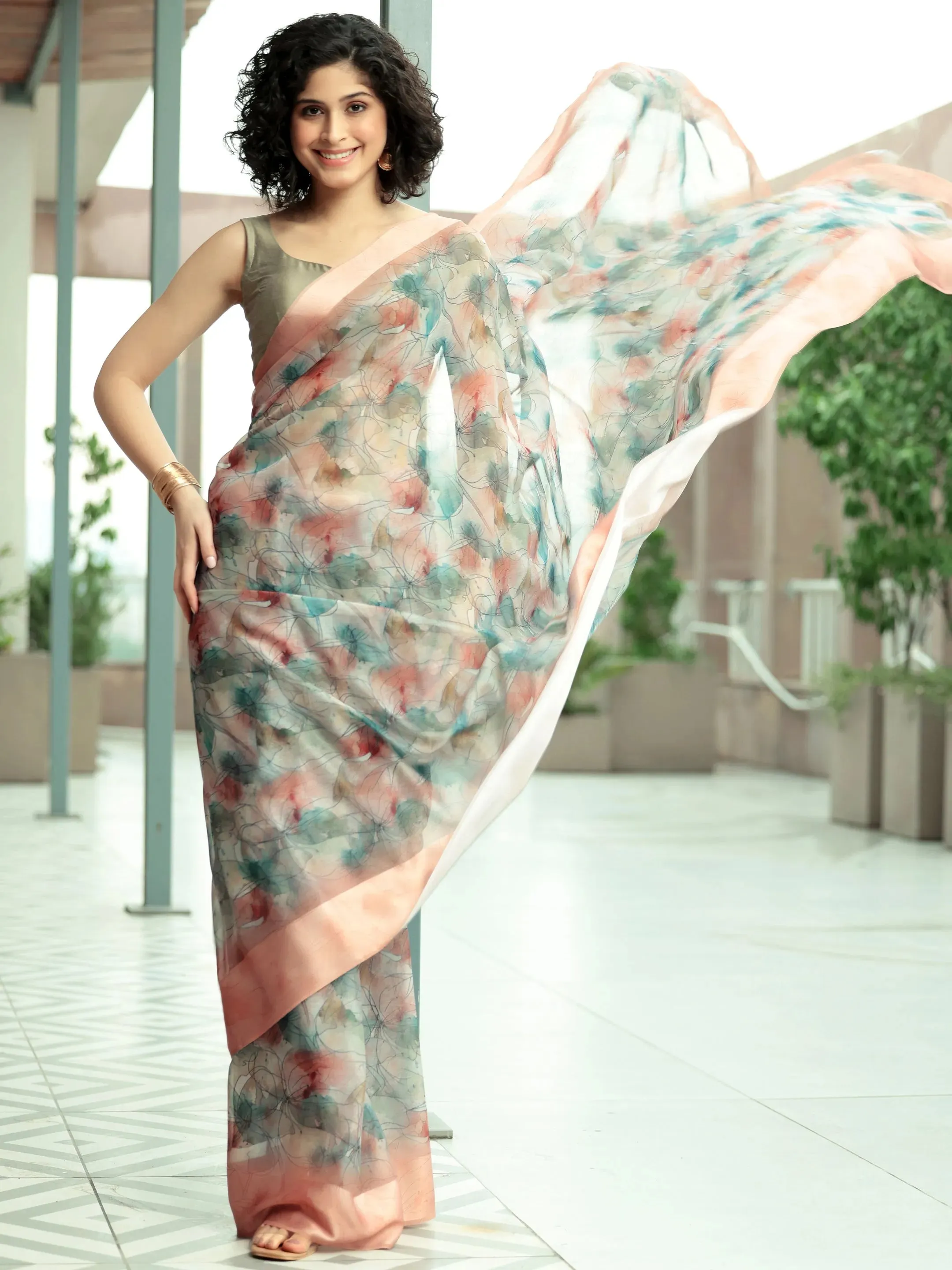 Peach Printed Poly Chiffon Saree With Unstitched Blouse Piece